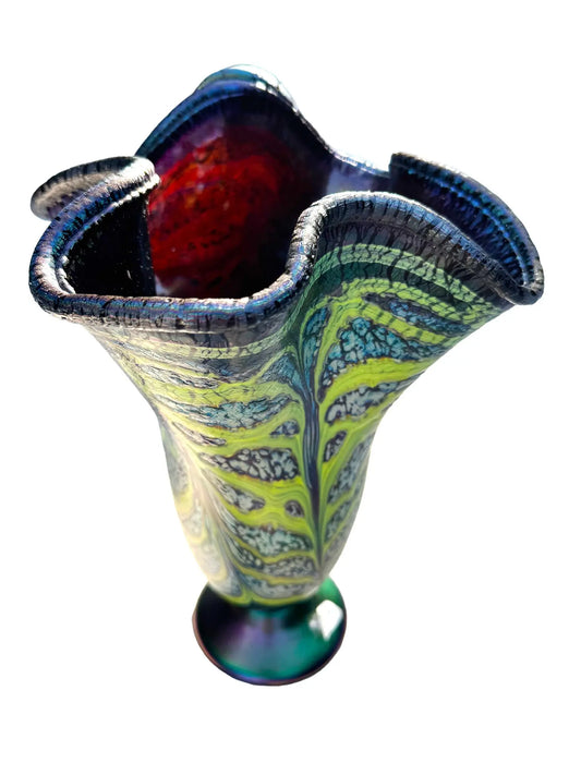 This large Rachel I glass vessel features a calming blue base with organic lime green veining and an iridescent fluted rim that shifts colors in light, reflecting mineral-like imagery. It measures approximately 10" wide by 13.5" high and weighs 3.9 lbs, showcasing modern glass artistry.