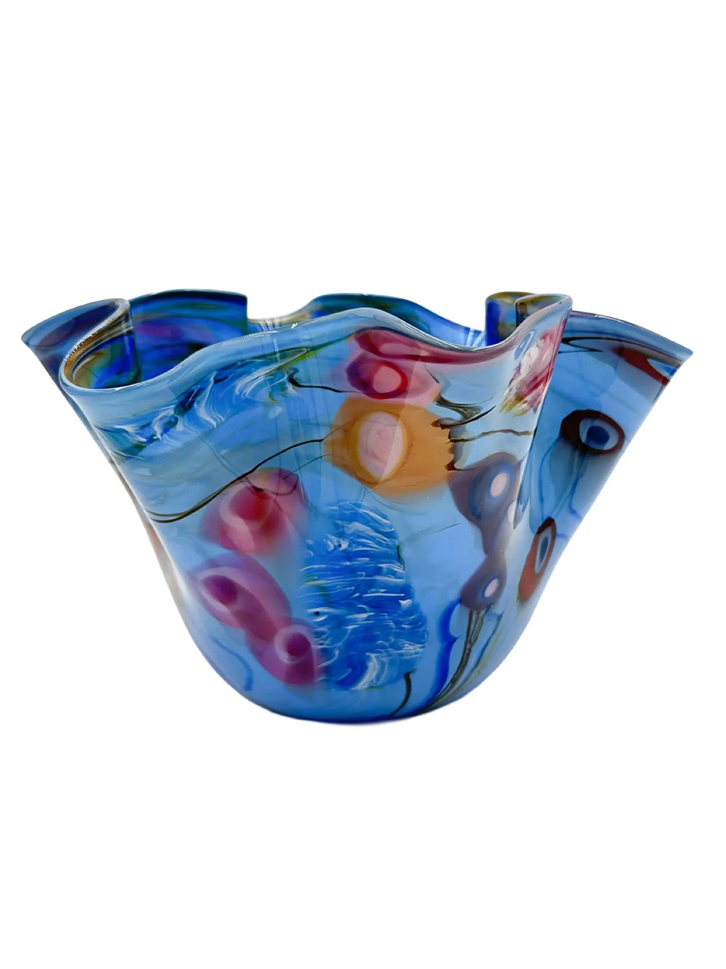 Ocean Song by Steve Palmer is a handcrafted glass bowl inspired by underwater life, featuring ruffled edges and a sky-blue base with vibrant abstract red, orange, pink, and deep blue patterns, conveying movement and energy. Measures approximately 13" wide, 9" high, and weighs 6.15 lbs.