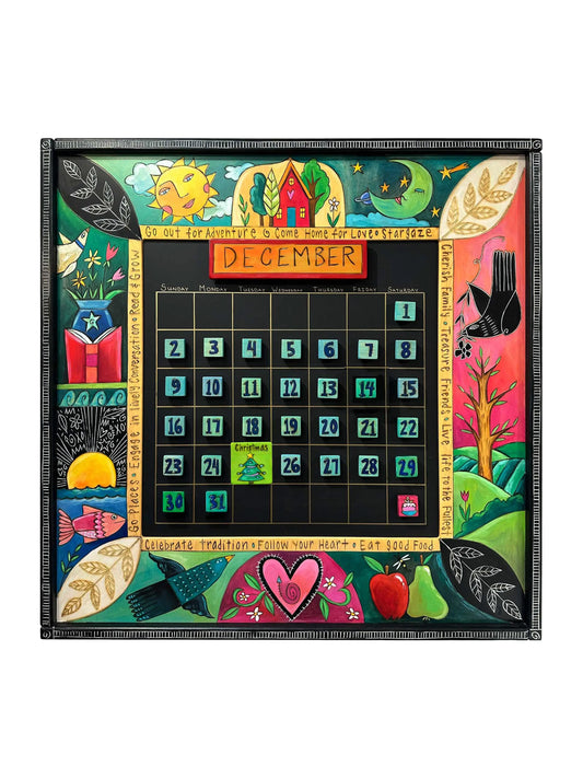 This vibrant, handcrafted perpetual wall calendar made of real wood features whimsical illustrations, inspiring phrases, and a magnetic grid for easy date updates. Decorated with motifs like a house, sun, blackbird, and more, it includes holiday magnets and 12-month plates. With dimensions of 38 inches square, it combines art and function, serving as a joyful, inspiring decor piece for year-round organization and motivation.