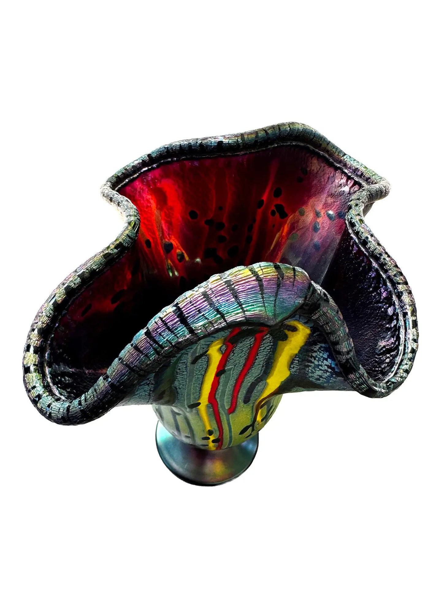 This vibrant, large molten organic vessel by Rick Hunter features a deep blue base with multicolored vertical drippings and an iridescent, shimmering rim in purple, green, and copper hues. Measuring approximately 12 inches in width and height, and weighing 2.82 pounds, this unique glass piece radiates energy and movement, showcasing bold colors and dynamic design in a one-of-a-kind artwork. 