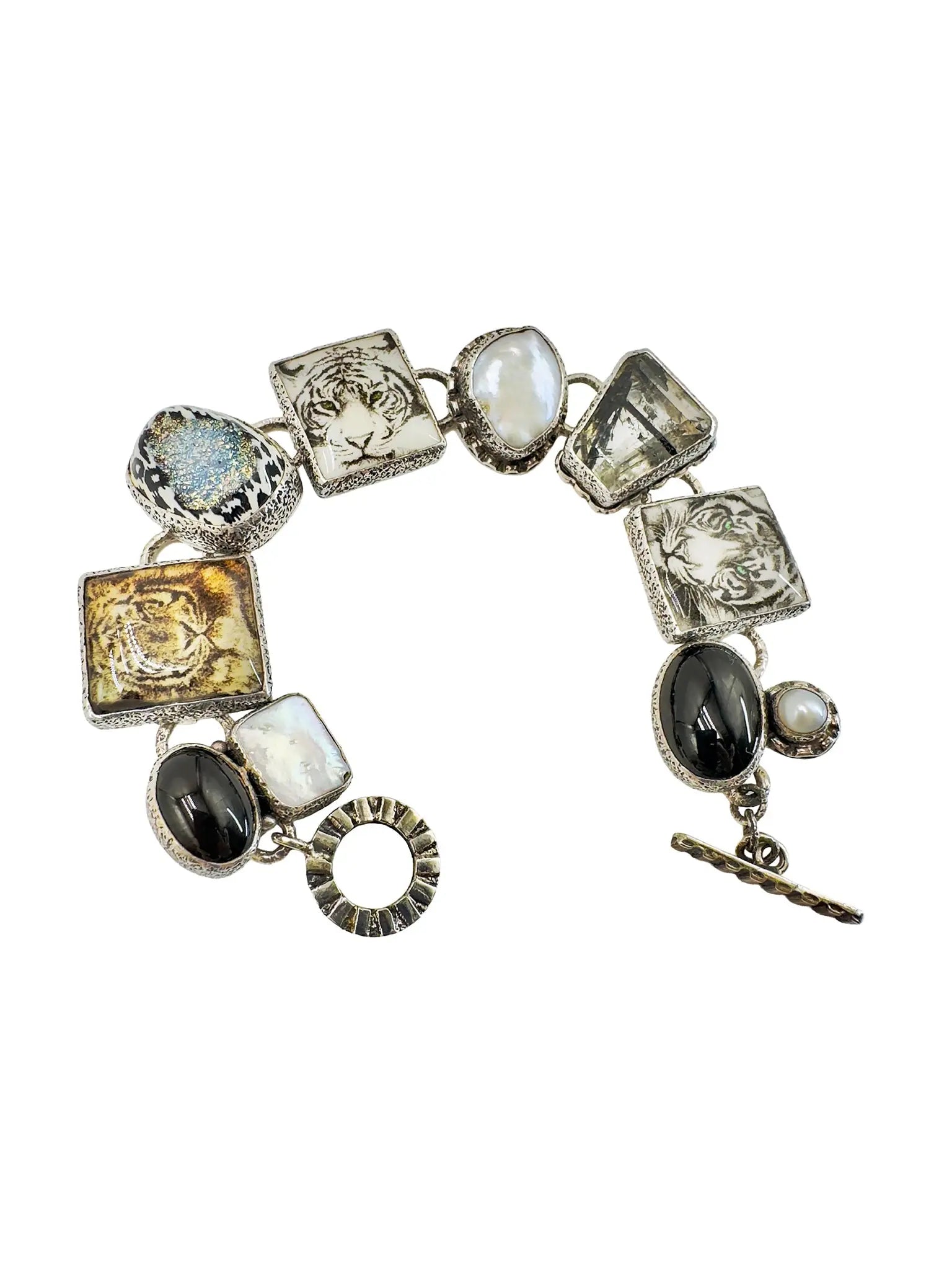 Amy Kahn Russell sterling silver station bracelet with black onyx, mabe pearls, and glass tiger face tiles.