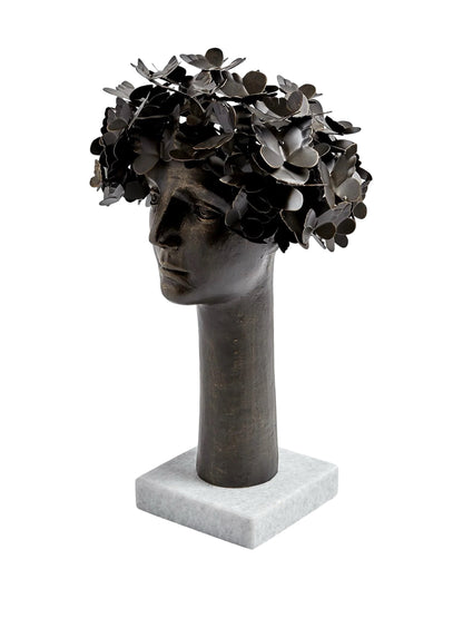 This detailed description presents 'Butterflies for Brains,' a bronze sculpture with gold highlights by Global Views Studios. It features a bust with iron butterflies emerging from the head, symbolizing thought and transformation. Set on a marble base, the piece measures approximately 16" x 12" x 23.5" and weighs 21.8 lbs., combining whimsy and introspection for any space.