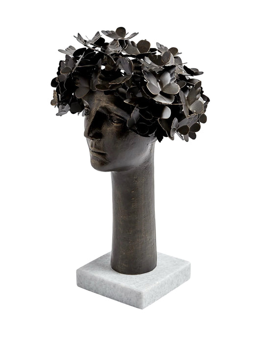 This detailed description presents 'Butterflies for Brains,' a bronze sculpture with gold highlights by Global Views Studios. It features a bust with iron butterflies emerging from the head, symbolizing thought and transformation. Set on a marble base, the piece measures approximately 16" x 12" x 23.5" and weighs 21.8 lbs., combining whimsy and introspection for any space.